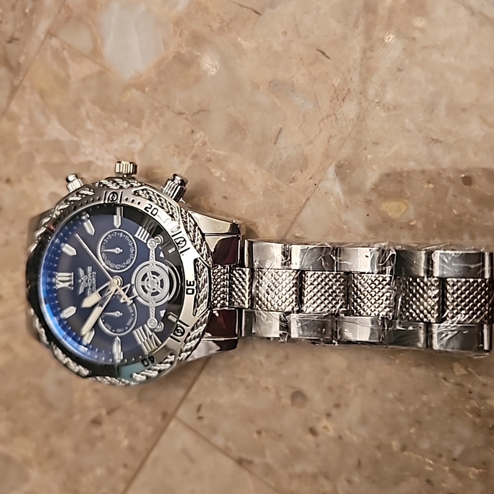 Blue and silver zhowe watch